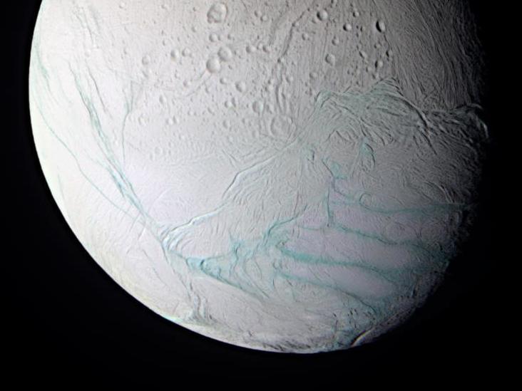 caption: A probe that will land on Saturn's moon Enceladus, seen here in false color, is one of the priorities outlined in the new report.