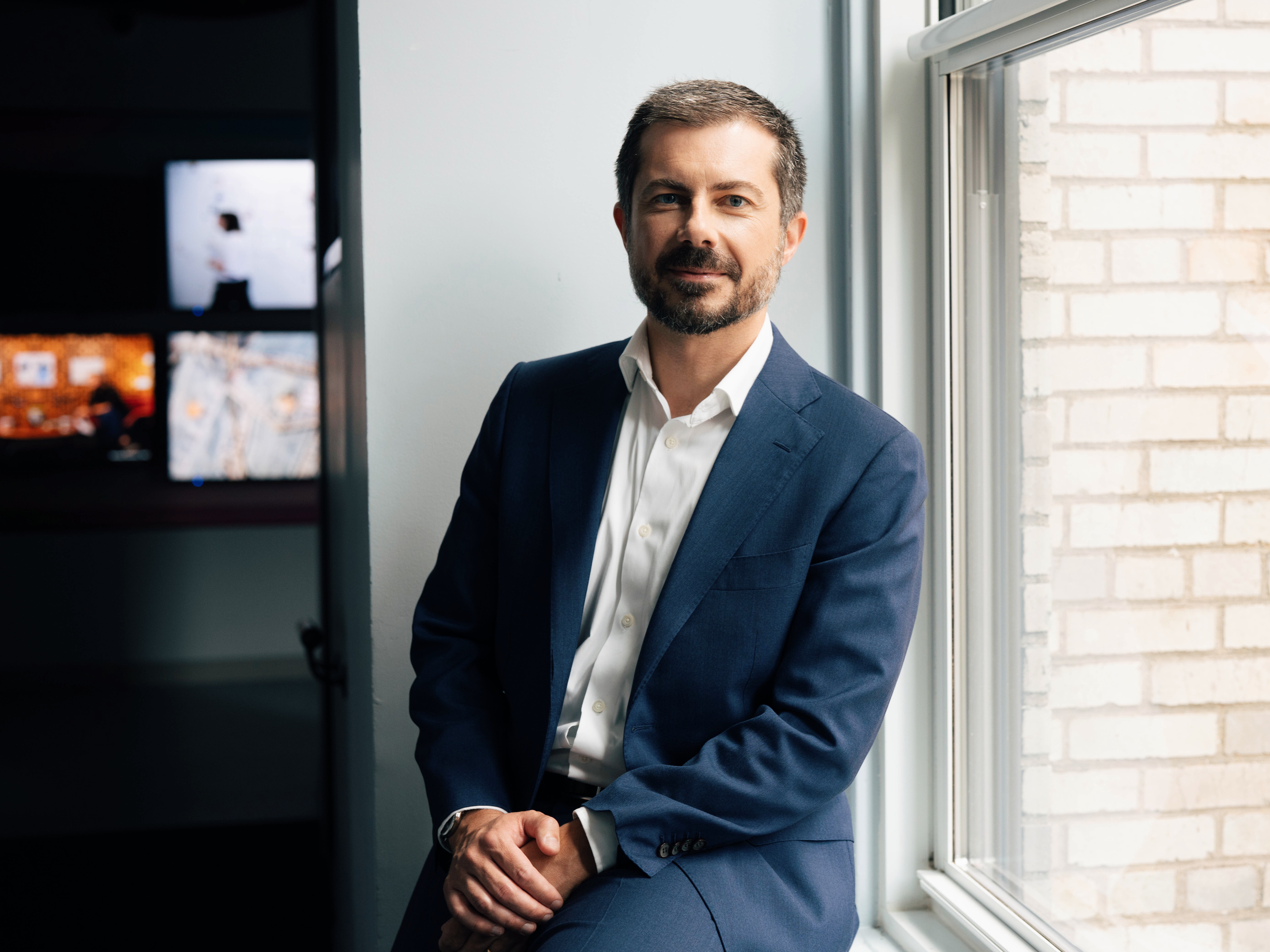 caption: Pete Buttigieg, the former U.S. Secretary of Transportation, poses for a portrait at NPR's office in New York on Wed., July 23.