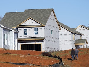 caption: New homes under construction in Mebane, N.C., earlier this month. A historic shortage of homes for sale has been pushing prices sharply higher. So builders are trying to ramp up projects.