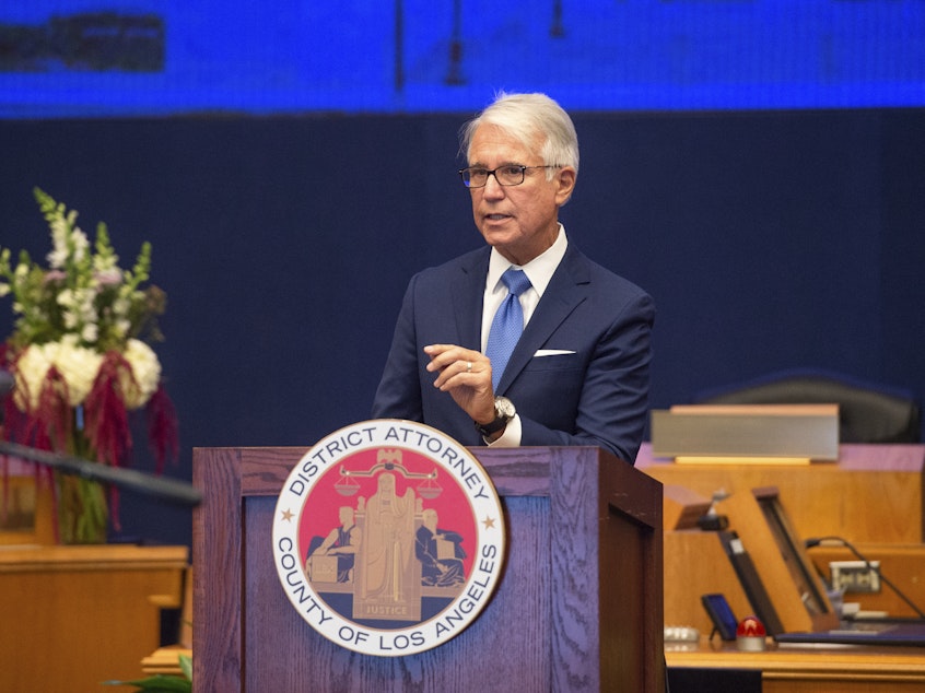 caption: Los Angeles County District Attorney George Gascón, seen here in 2020, said his office had aided in the arrest of the CEO of a Michigan-based election software company on "suspicion of theft of personal identifying information."