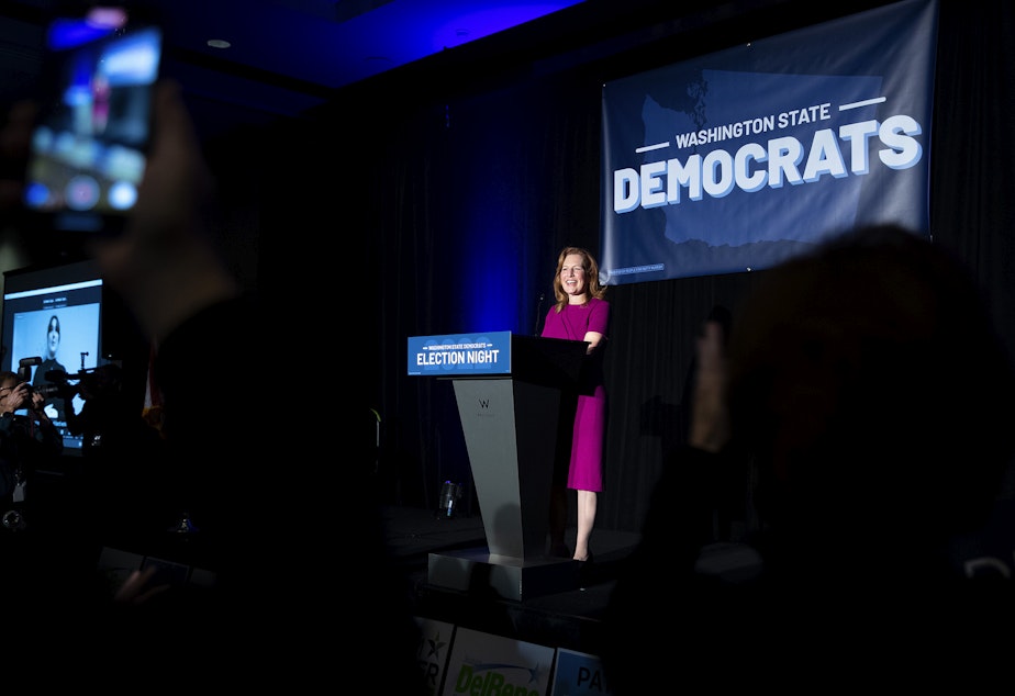 caption: Congresswoman Kim Schrier smiles while speaking to supporters during an election night party on Tuesday, November 8, 2022, at the Westin in Bellevue.