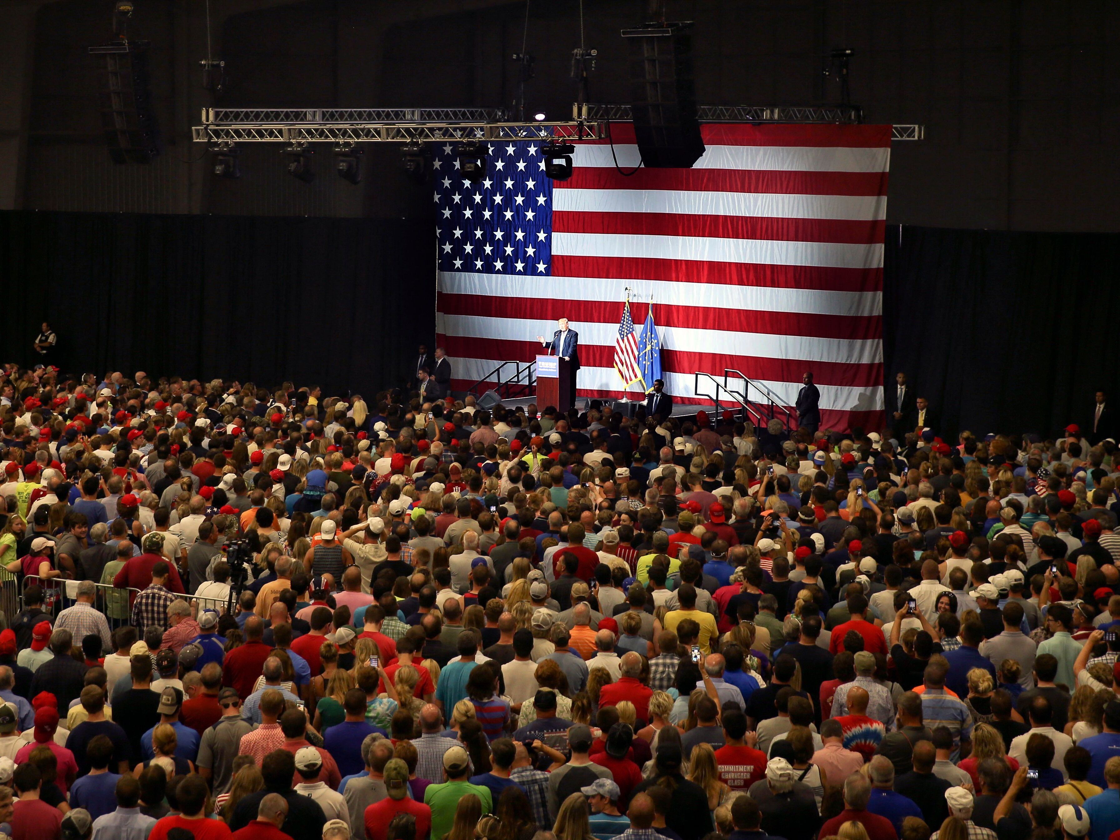 caption: In 2016, Donald Trump, as the then-presumptive Republican nominee for U.S. president, addresses a campaign rally at the Grand Park Events Center in Westfield, Ind., where Trump's current federal hiring freeze has forced a special local census to be put on hold.