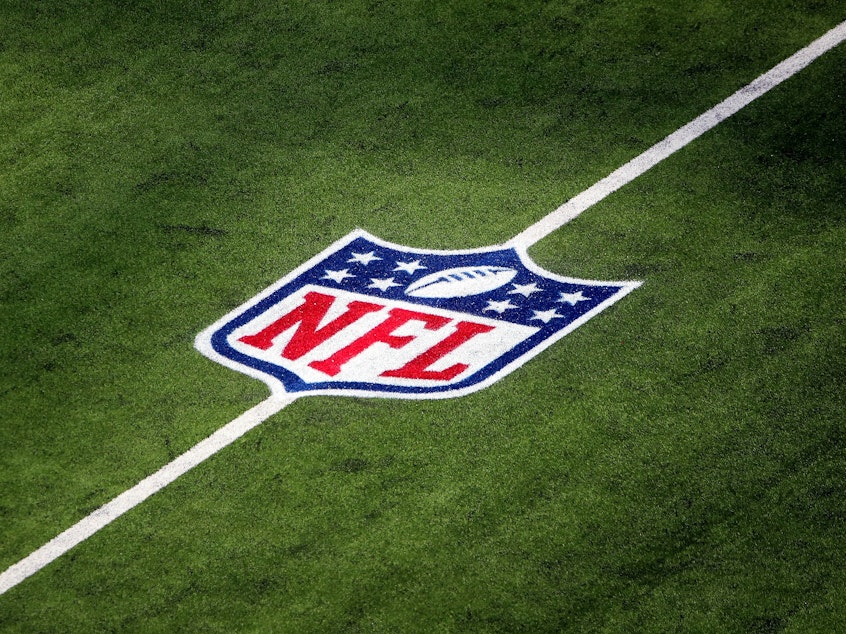 caption: Researchers examined all 19,423 NFL players who took the field for at least one game from 1960 to 2019 in what the scientists said was the largest study of ALS risk in professional football players.
