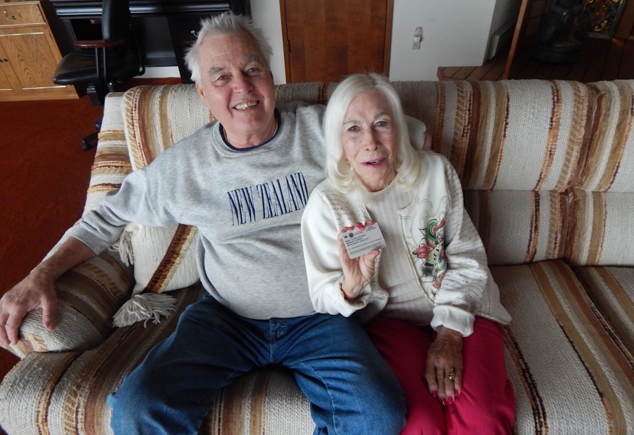 caption: Gloria Hoeppner holds her VA choice card with husband Earl Kornbrekke at their home in Friday Harbor, Washington.