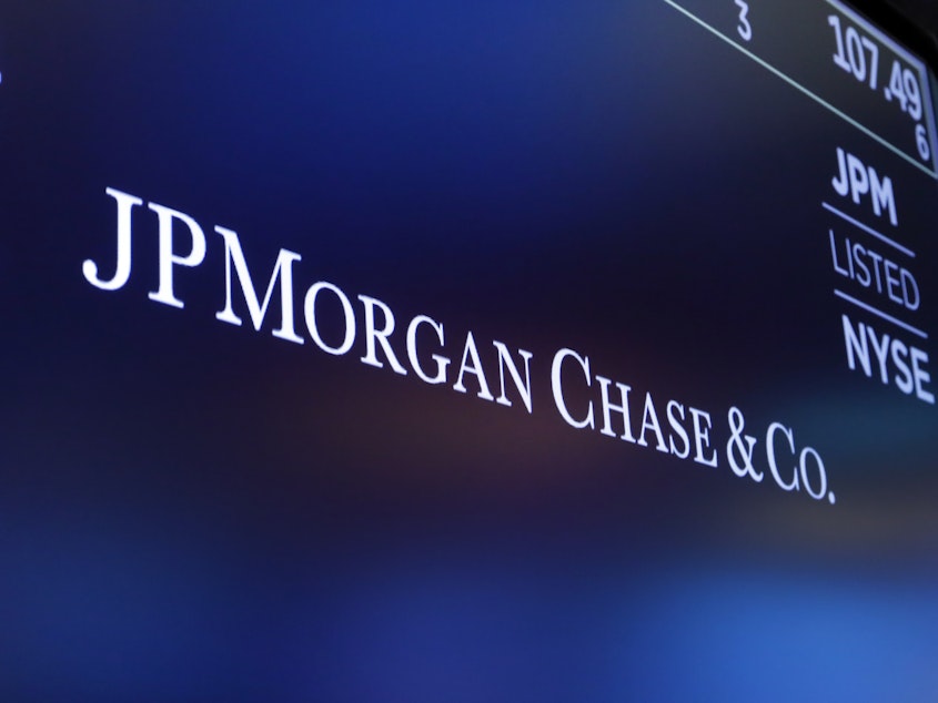 caption: JPMorgan Chase says it's having to put more money into reserve to cover bad loans.