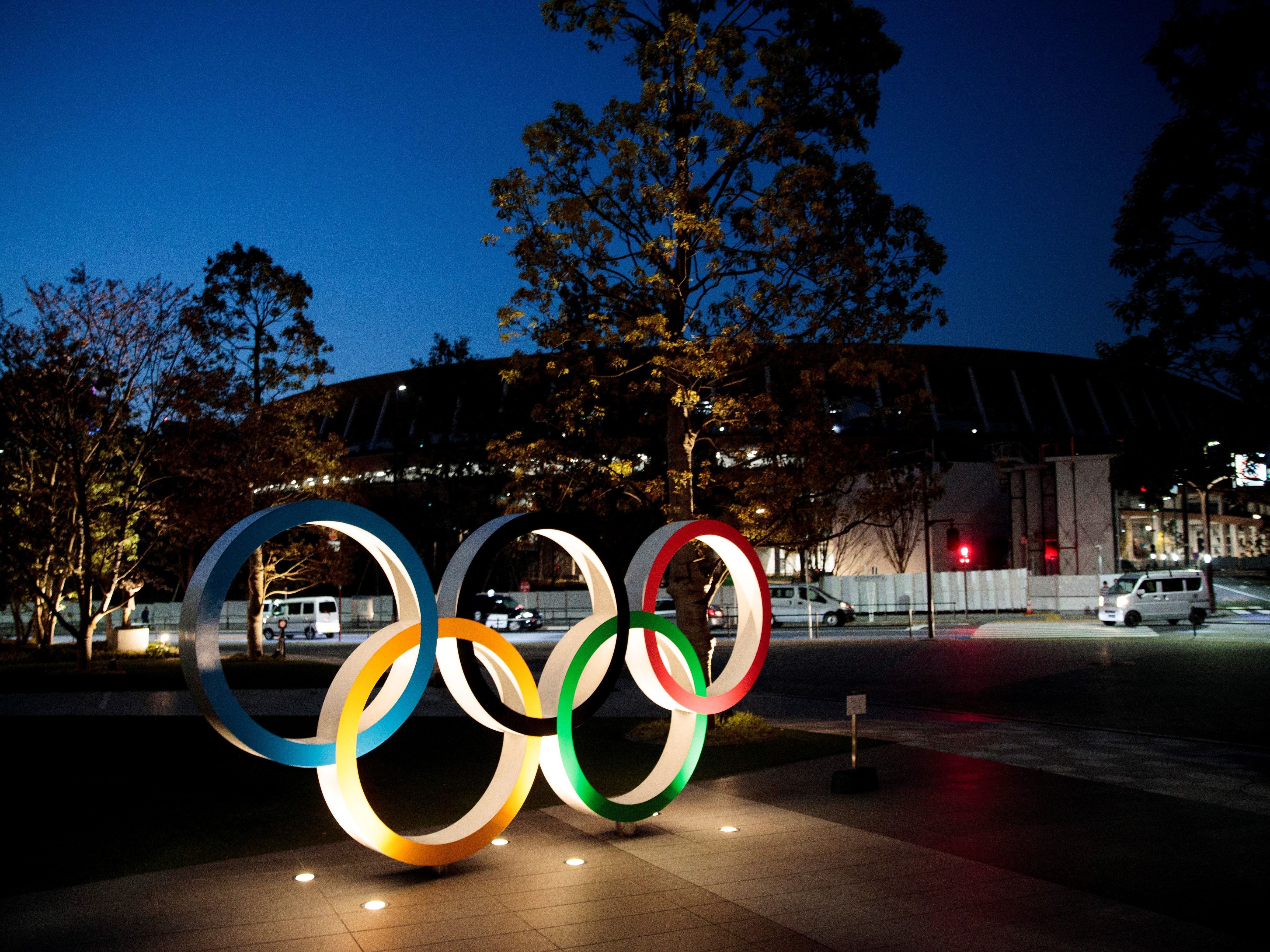 caption: The Olympic rings displayed outside the National Stadium, a venue for the 2020 Olympic Games, in Tokyo last year. The Games have been delayed until 2021 because of the coronavirus.