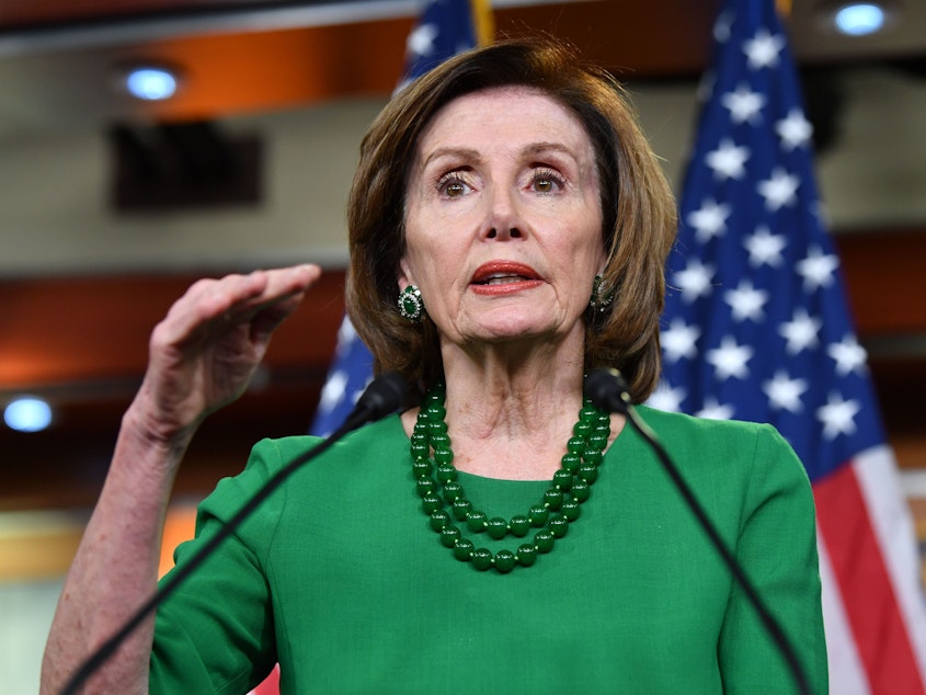 caption: House Speaker Nancy Pelosi discusses coronavirus legislation during her weekly briefing Thursday on Capitol Hill.