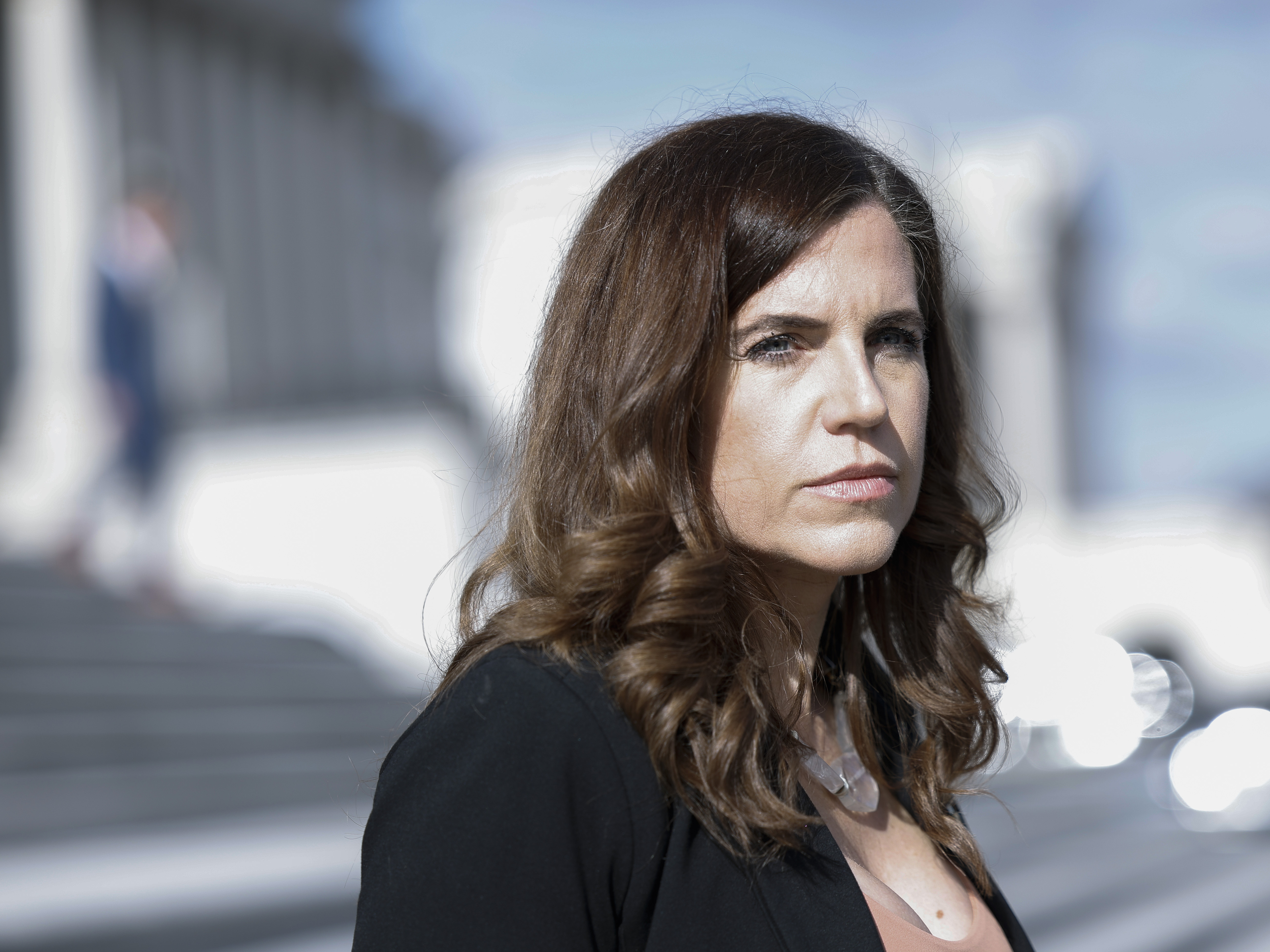 caption: Rep. Nancy Mace speaks to reporters as she leaves the U.S. Capitol Building on January 27, 2023.