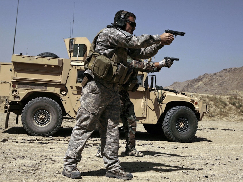 caption: U.S. Army Special Forces soldiers trained in Afghanistan in 2009. Members of Congress want answers about reported Russian bounties paid to target American troops.