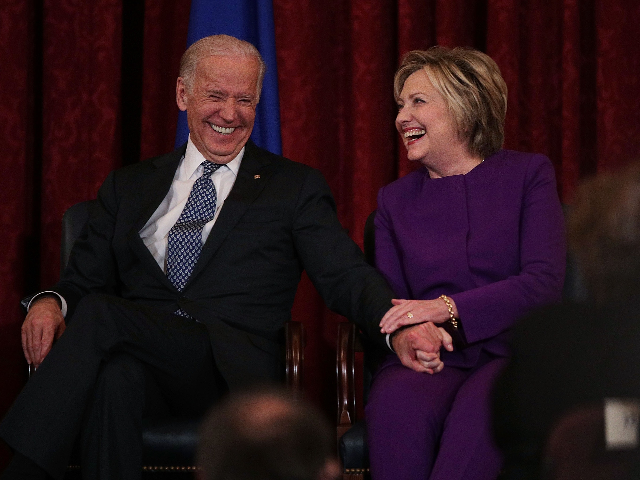 caption: Joe Biden and Hillary Clinton, when they served as vice president and secretary of state, respectively, are seen here on Dec. 8, 2016. Biden is honoring Clinton and 18 others with the Medal of Honor.