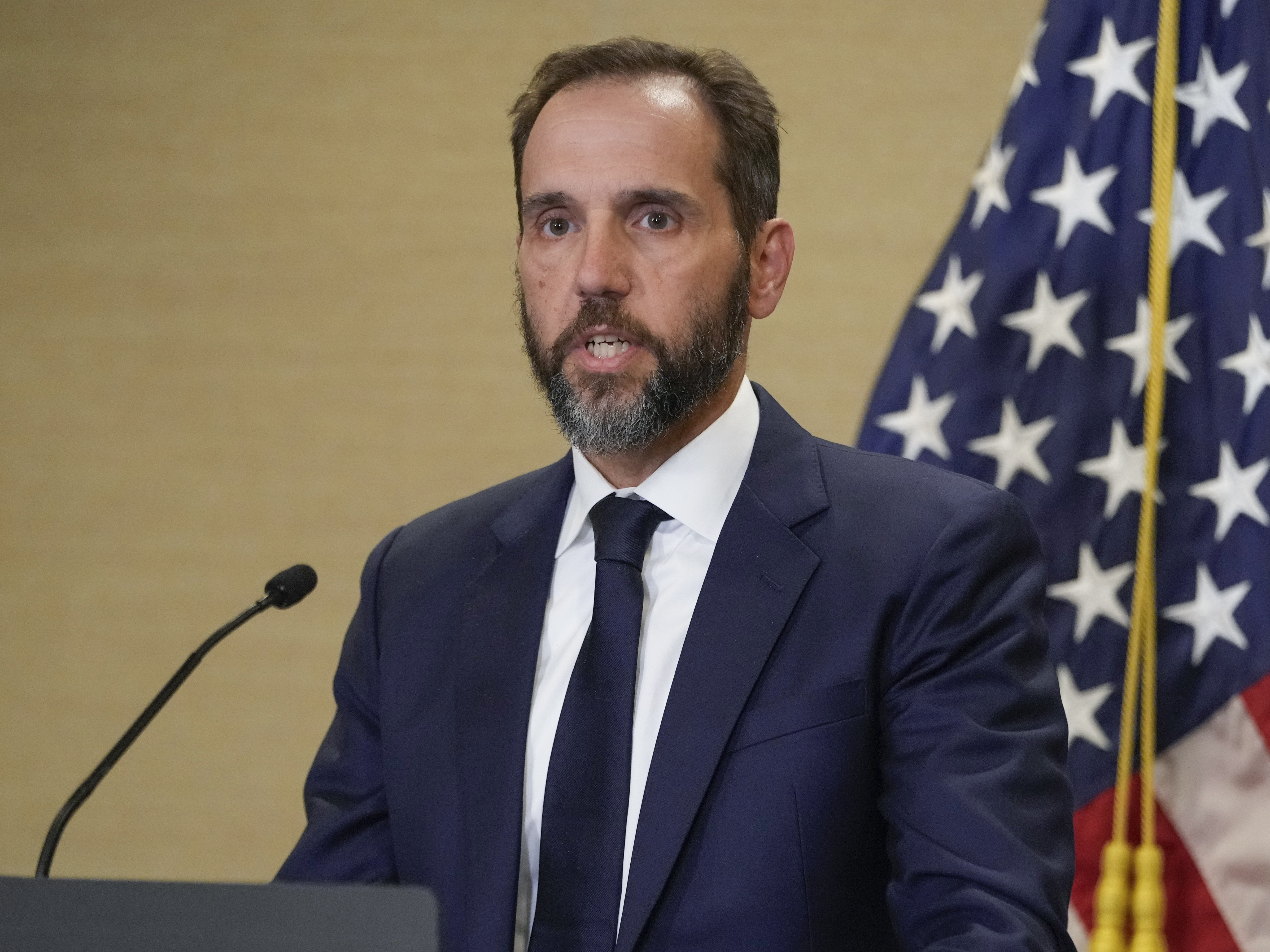 caption: Special counsel Jack Smith speaks about an indictment of former President Donald Trump, Aug. 1, 2023, at a Department of Justice office in Washington. Federal prosecutors in the case charging Trump with scheming to overturn the 2020 election are seeking an order that would restrict the former president from "inflammatory" and "intimidating" comments about witnesses, lawyers and the judge.