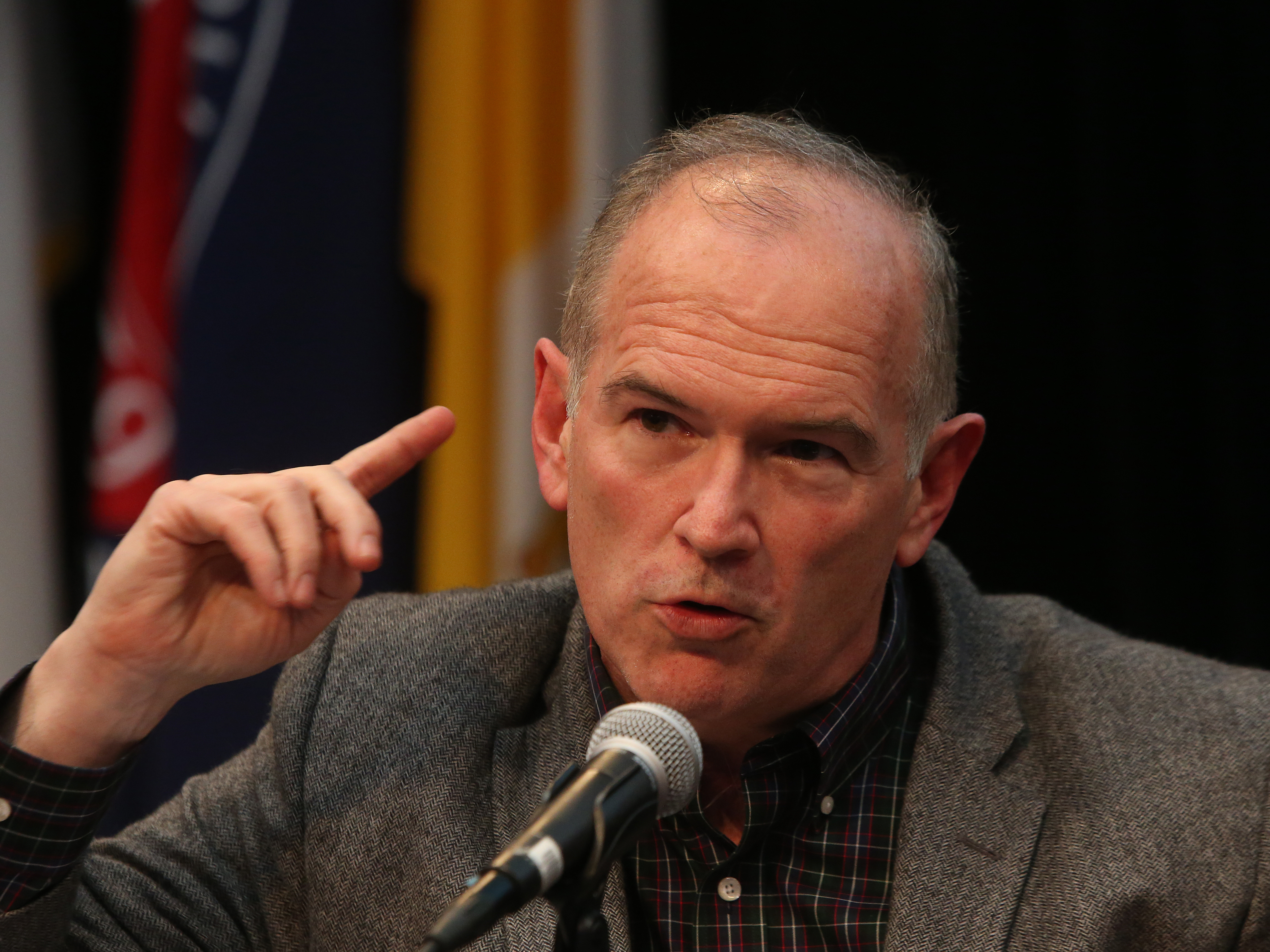 caption: NY Times writer & panel moderator Jim Dwyer. The Brooklyn Heights Association's meeting at St Francis College concluded with community service awards to Brooklyn Heights activists, and a panel discussion of the pros & cons of the proposed Brooklyn-Queens trolley system.