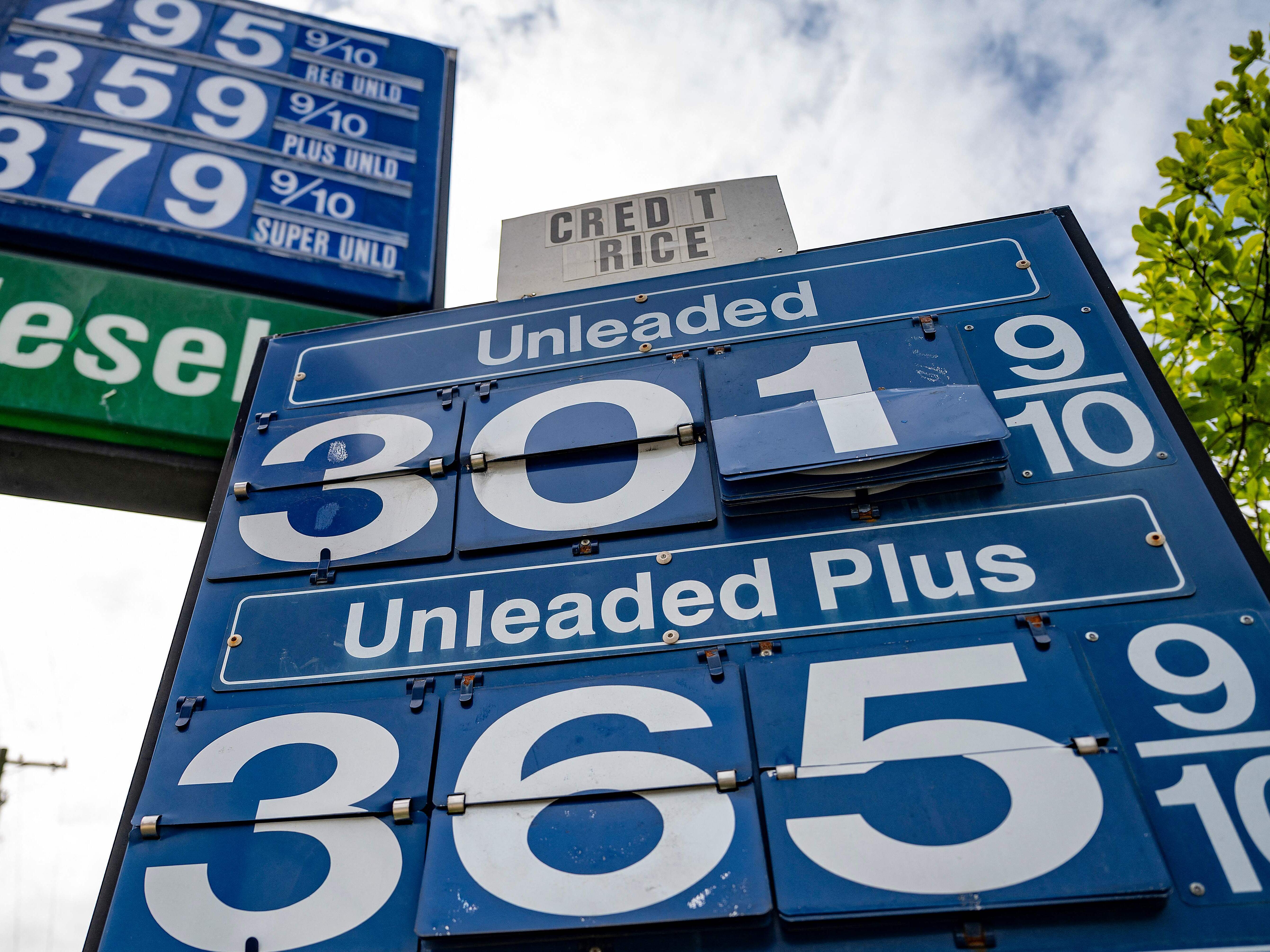 caption: Falling gasoline prices helped keep inflation in check last month.  AAA says the average price of regular gas nationwide is $3.22.