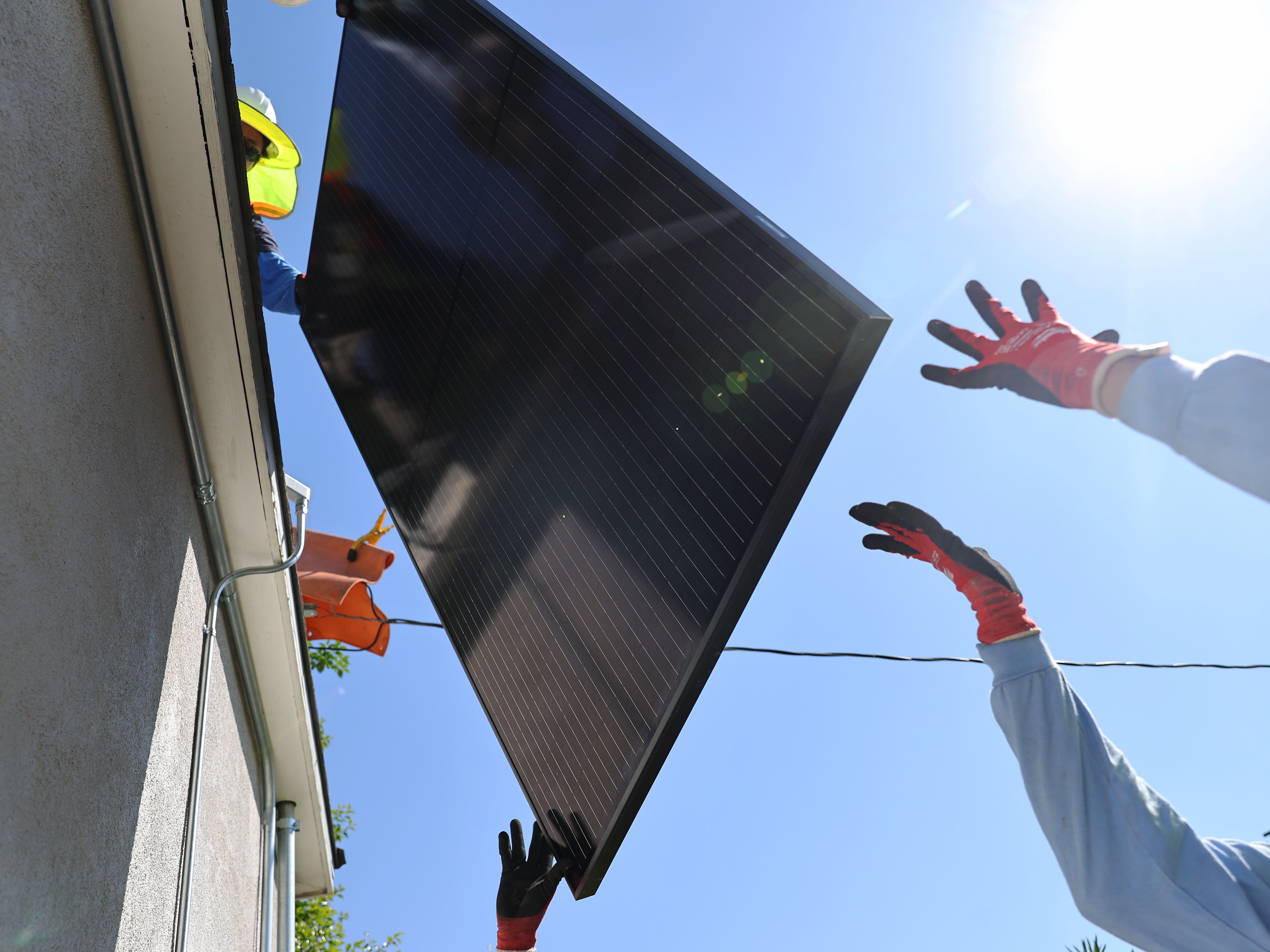 caption: In the coming months, there will be "a 'hurry-up-and-buy' 'limited-time-offer' kind of dynamic" to get government incentives for home solar and other energy-efficient technologies, says Ari Matusiak, CEO of the nonprofit Rewiring America. <br>