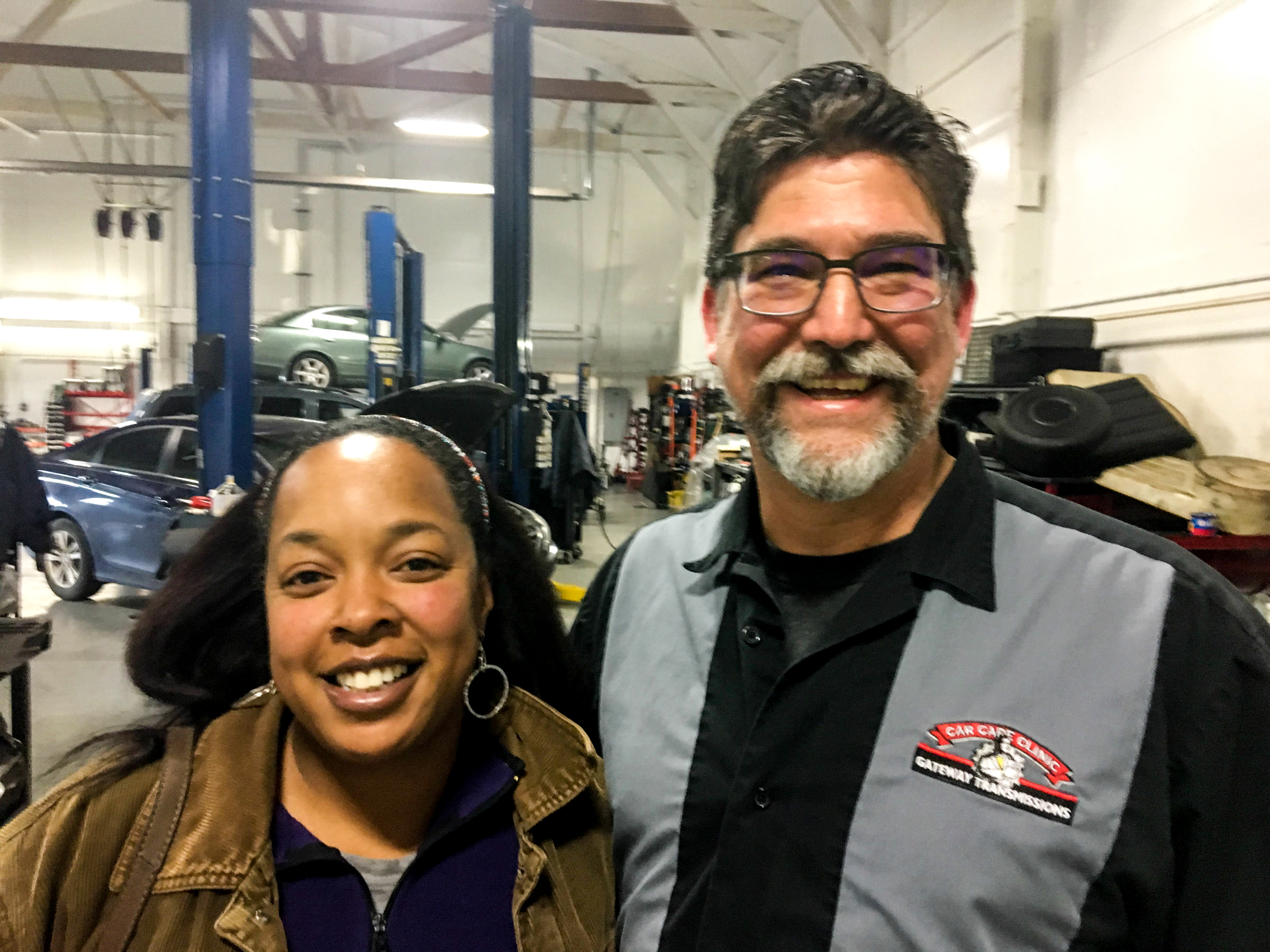 caption: Democrat Germaine Kornegay and Republican Bill Orsborn try to bridge the partisan divide at Gateway Car Clinic and Transmissions in Mount Vernon, Washington 