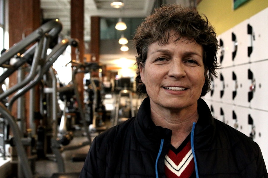 caption: Tija Petrovich, owner of Seattle Fitness, lives and works in Pioneer Square. 