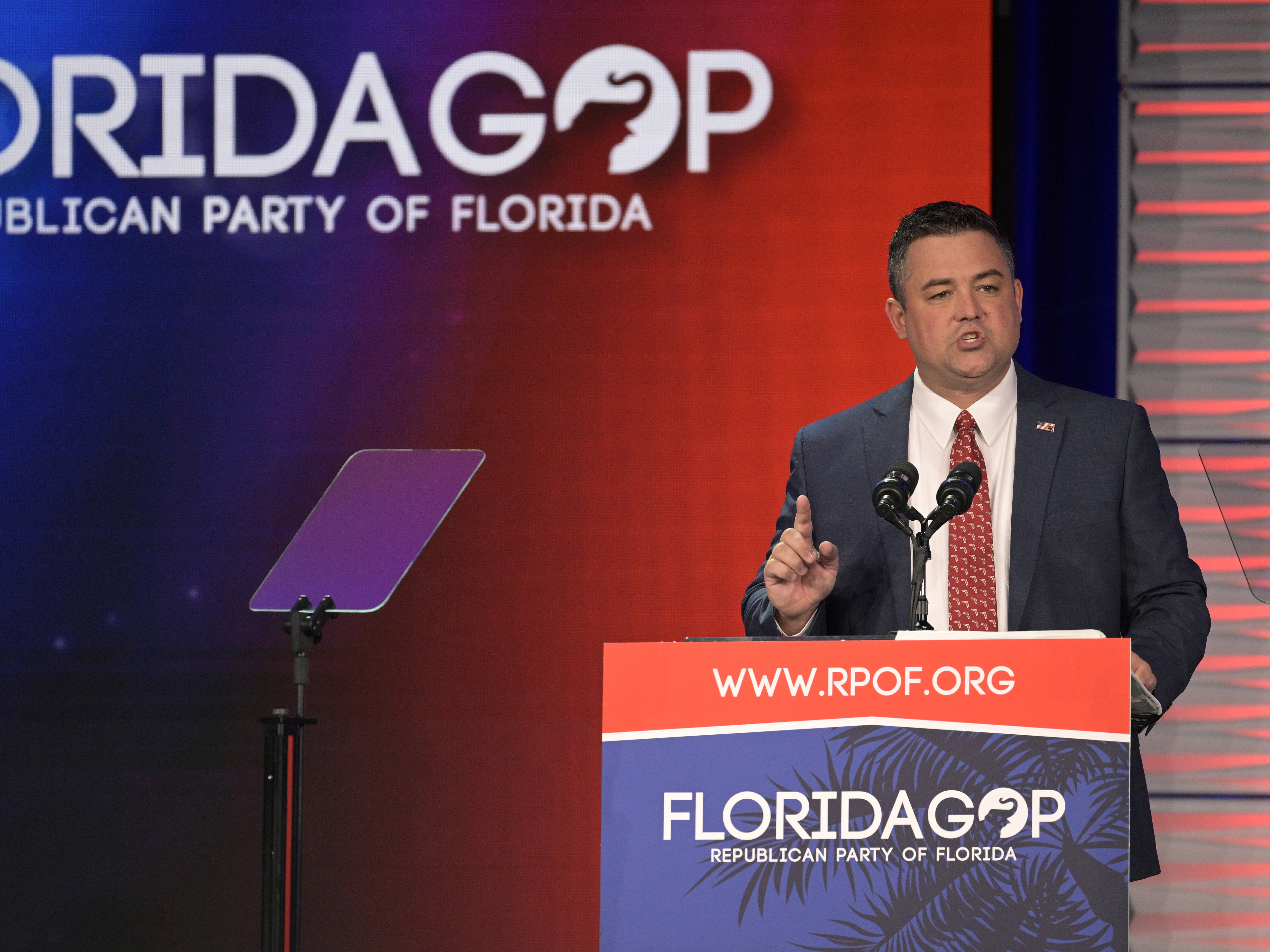 caption: Florida Party of Florida Chairman Christian Ziegler addresses attendees at the Republican Party of Florida Freedom Summit on Nov. 4 in Kissimmee, Fla. The Republican Party of Florida suspended Ziegler and demanded his resignation during an emergency meeting on Sunday.