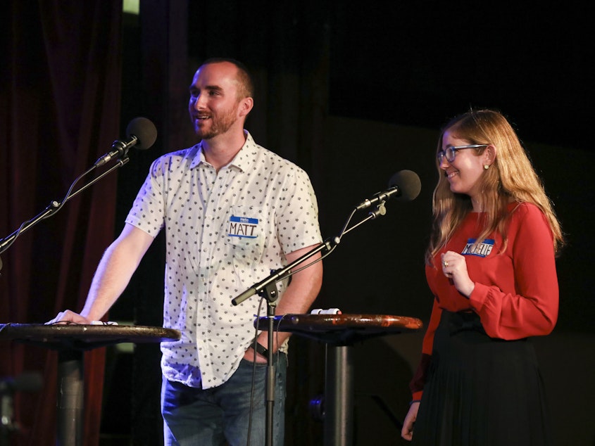 caption: Contestants Matt Spiegel and Michelle Barras appear on Ask Me Another at the Bell House in Brooklyn, New York.