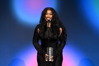 caption: SZA, seen here at The Webby Awards, was nominated for nine Grammy Awards, including album, record and song of the year.