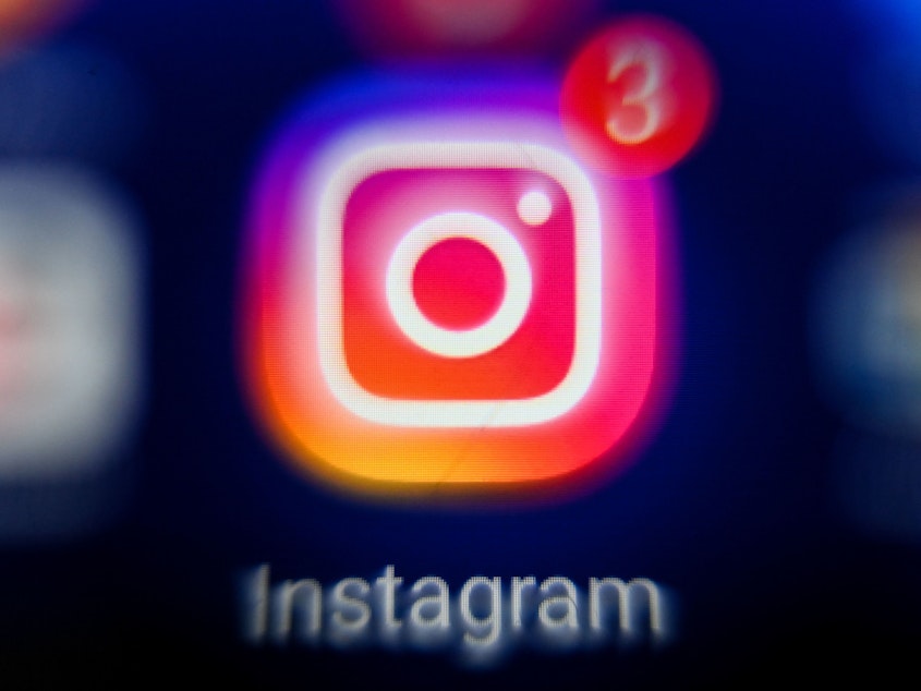 caption: Instagram is under investigation over how it attracts and affects its youngest users.