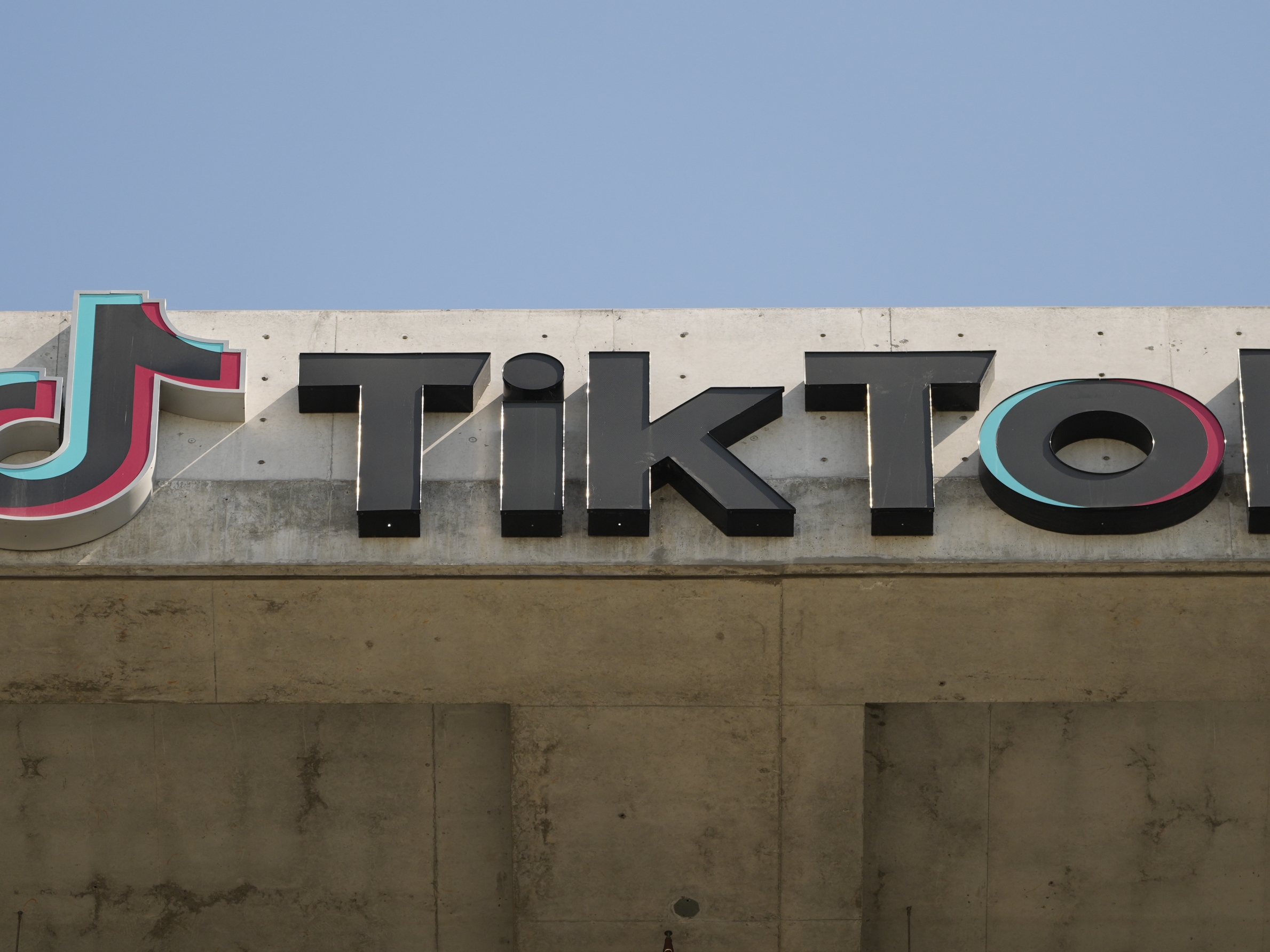 caption: A TikTok sign is displayed on the company's building in Culver City, Calif., in March 2024. 