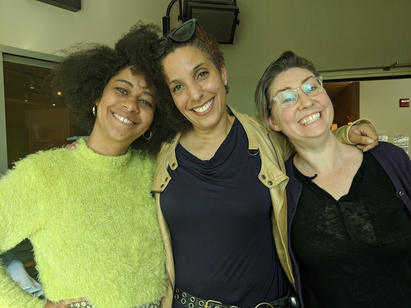 caption: From left, co-host Eula Scott Bynoe, TV critic Melanie McFarland, and co-host Jeannie Yandel.