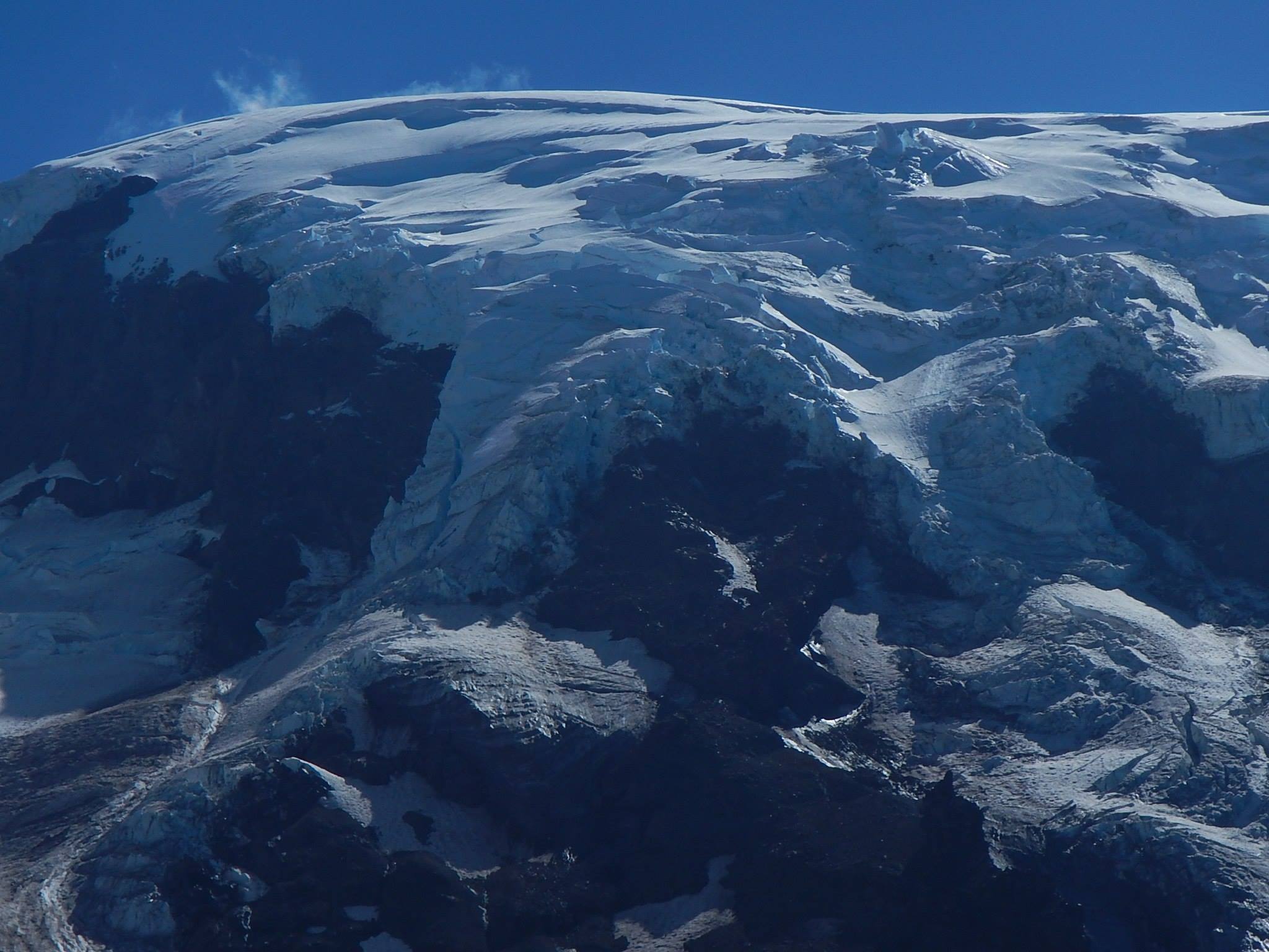 caption: The retreating Lyman Glacier on Mt. Adams. Washington Gov. Jay Inslee said White House "foolishness" wouldn't deter the state's efforts to slow the pace of global warming.