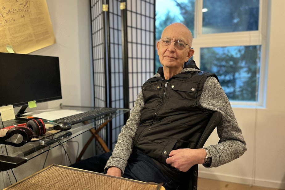 caption: Carl Wade at the Arete apartments in Kirkland.