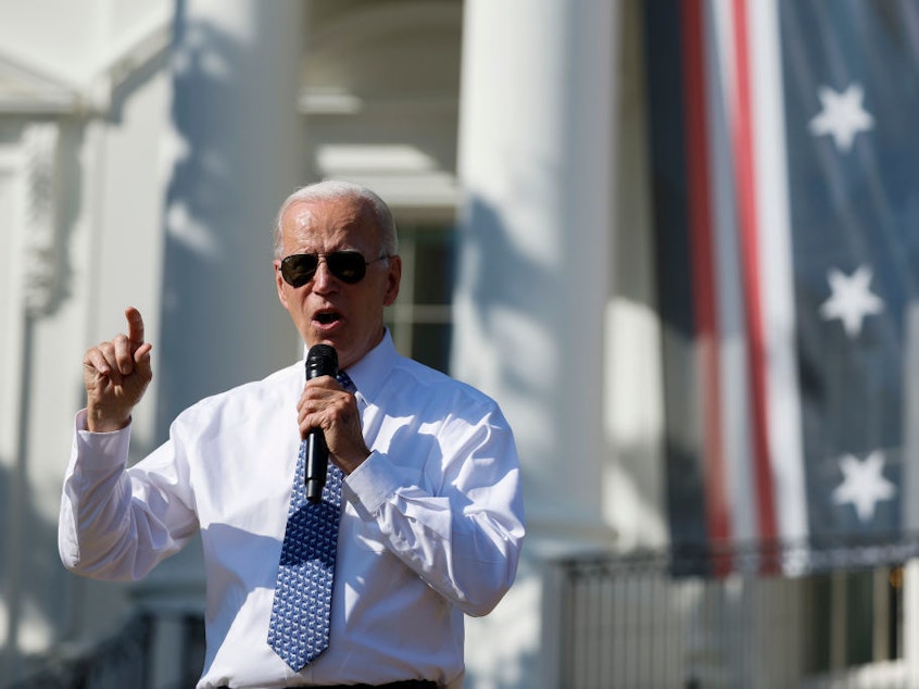 caption: U.S President Joe Biden speaks during an event celebrating the passage of the Inflation Reduction Act on the South Lawn of the White House on September 13, in Washington, DC. The new law gives Medicare the power to negotiate drug prices.