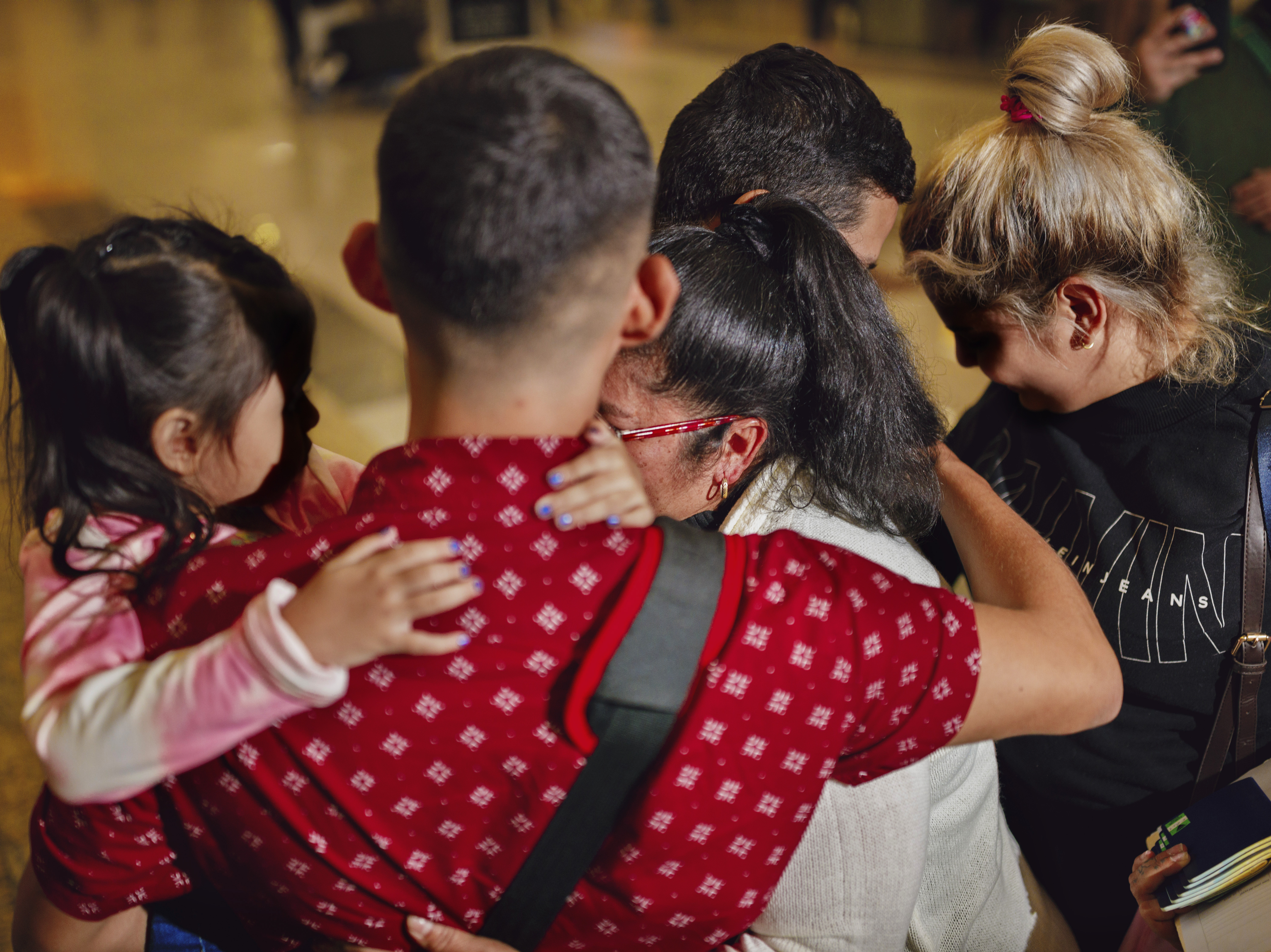 caption: After a long-running asylum case kept Anabel apart from her family in El Salvador for 8 years, she finally reunited with them at Hartsfield-Jackson Atlanta International Airport earlier this month.