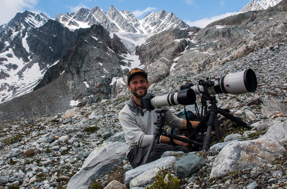 caption: Wildlife tracker and photographer David Moskowitz in the Selkirk mountains in Glacier National Park in BC during the filming of a documentary about Mountain Caribou. 
