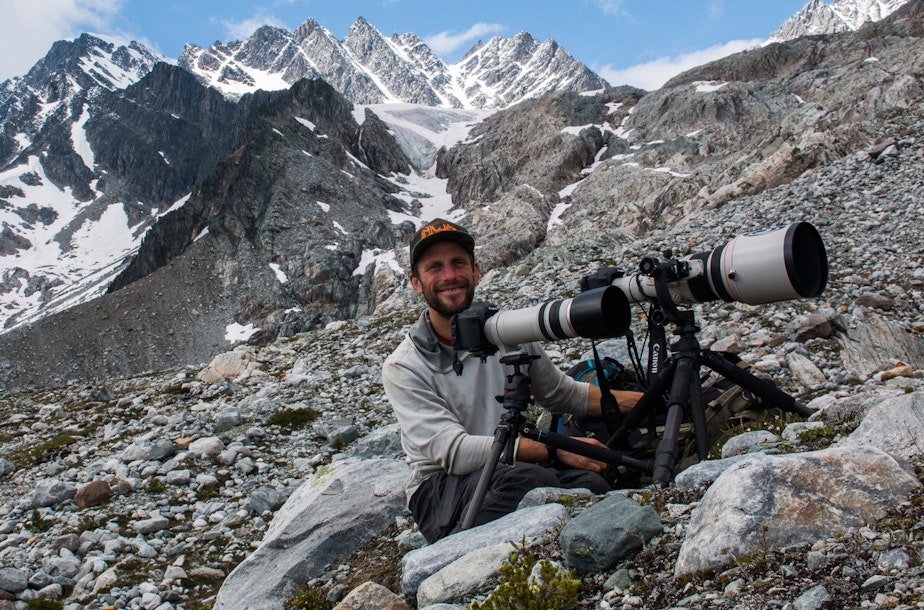 caption: Wildlife tracker and photographer David Moskowitz in the Selkirk mountains in Glacier National Park in BC during the filming of a documentary about Mountain Caribou.