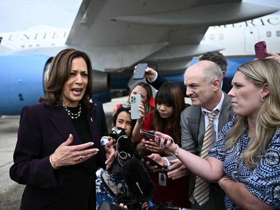 caption: Vice President and Democratic presidential candidate Kamala Harris speaks to reporters at Joint Base Andrews in Maryland on July 25. Harris has her first formal interview as the presidential nominee on Thursday.