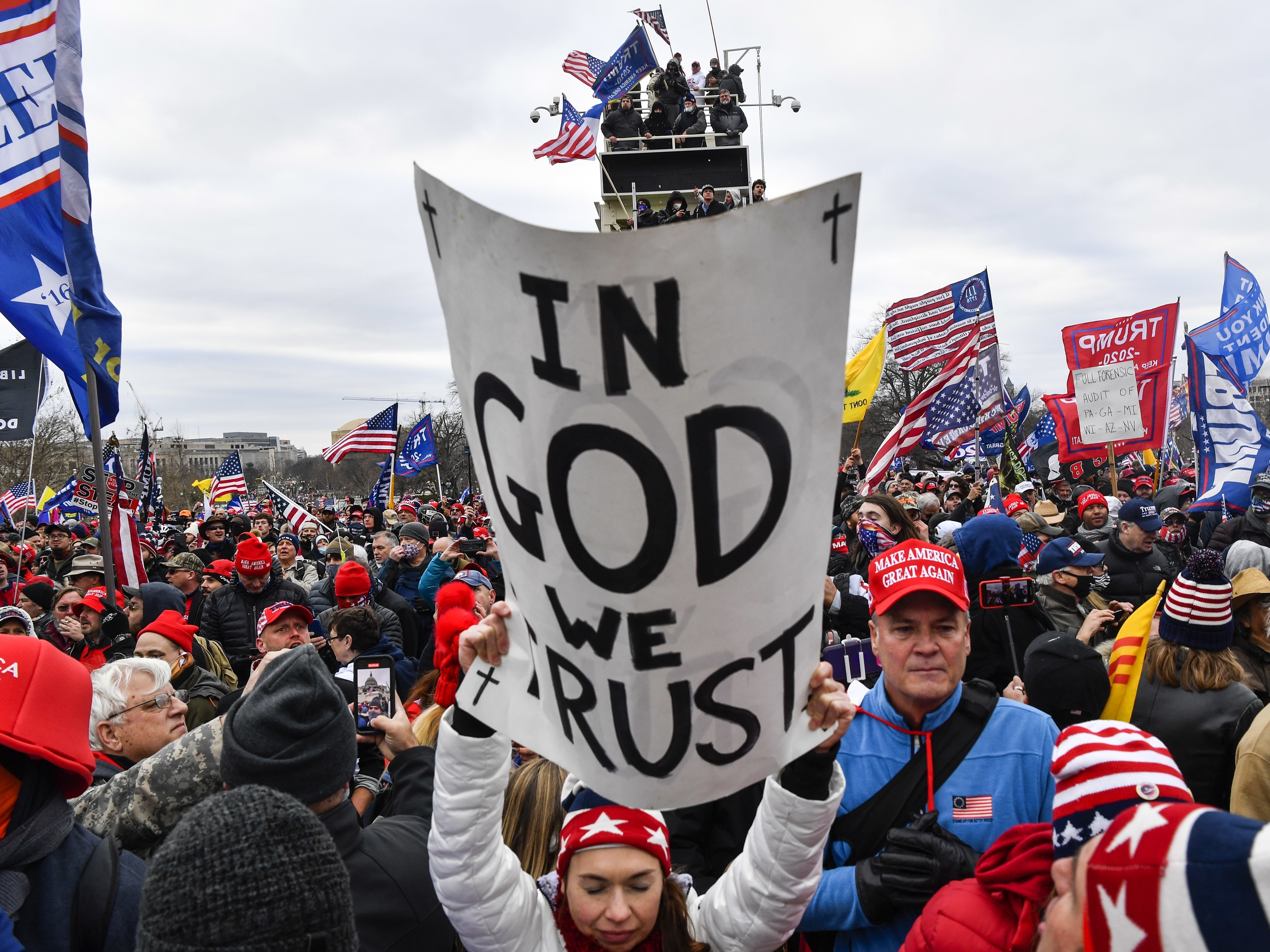 caption: Protesters gather at the U.S. Capitol on Jan. 6. Later that day, the Capitol building was breached by a violent mob driven by what's commonly known as "the big lie": that President Biden wasn't legitimately elected.