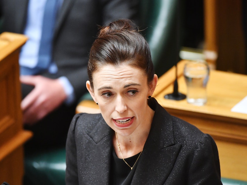 caption: Prime Minister Jacinda Ardern speaks to the parliament Tuesday as New Zealand considers new gun laws after the mass shooting in that stunned the country.