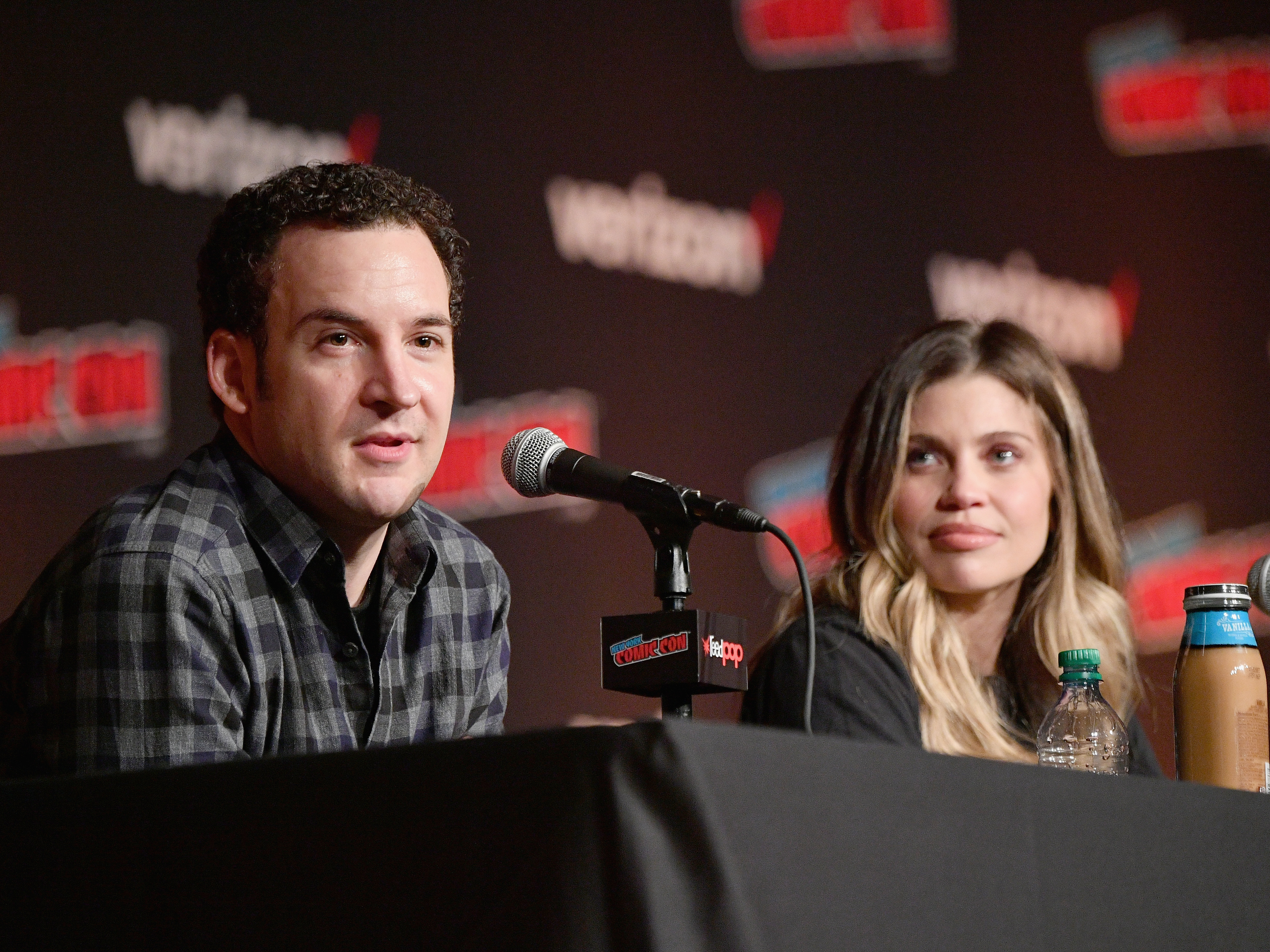 caption: Ben Savage (left) and Danielle Fishel speak onstage at the Boy Meets World 25th Anniversary Reunion panel during New York Comic Con 2018. Savage announced this week he is running for Congress.
