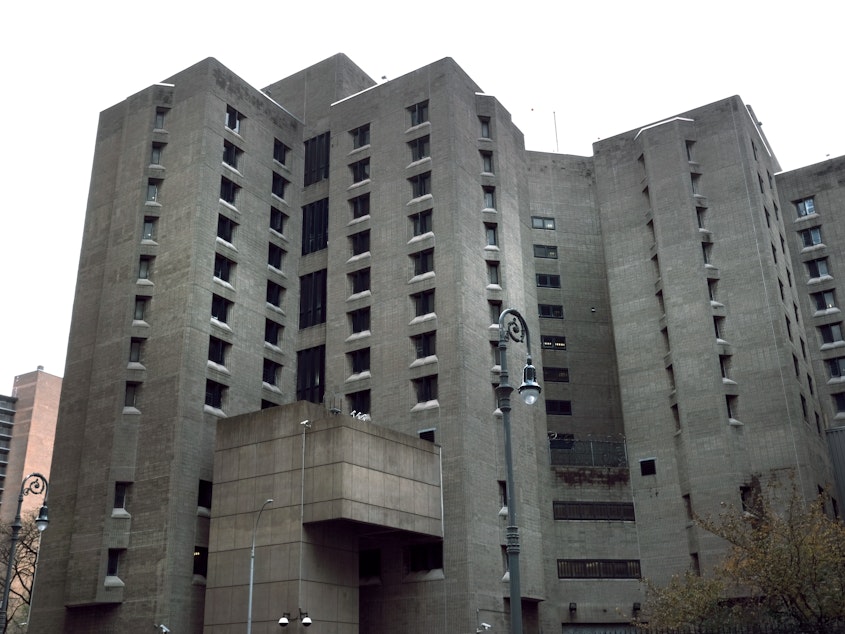 caption: The Metropolitan Correctional Center, which is operated by the Federal Bureau of Prisons, stands in lower Manhattan. A proposed deal would allow two guards to avoid incarceration for allegedly falsifying documents to conceal that they did not make the required checks on Jeffrey Epstein the night he died.