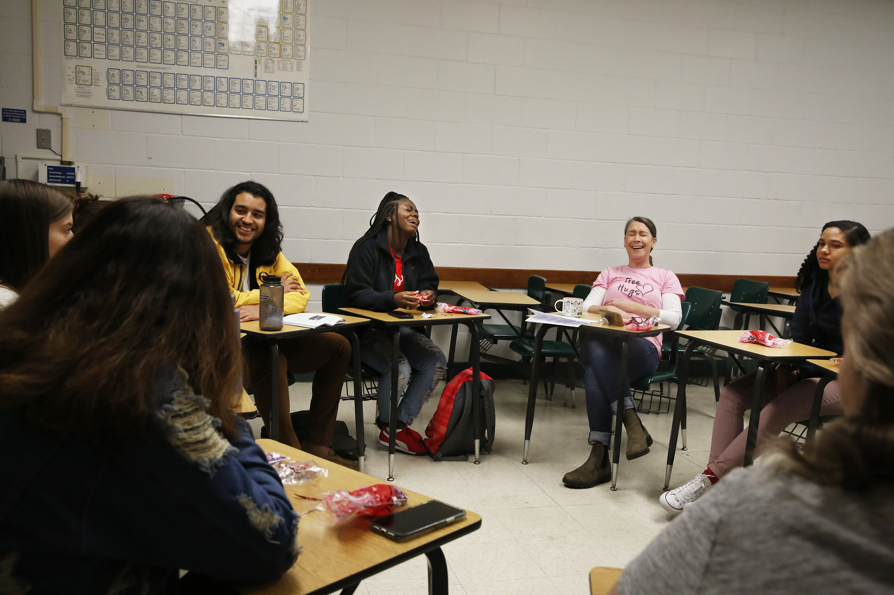 caption: Akiya Parks (center) in a class required for her Family, Youth and Community Sciences major.