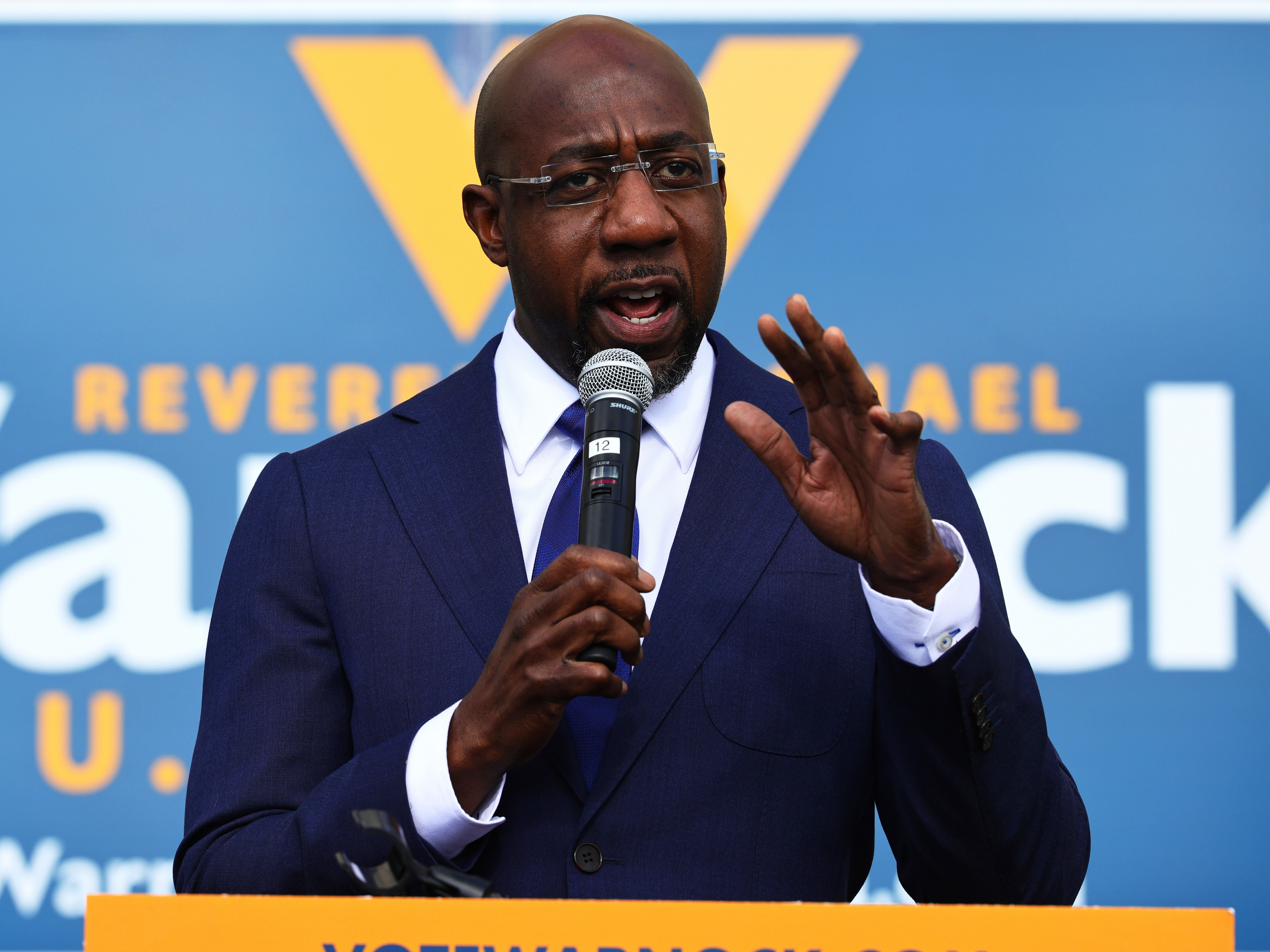 caption: Rev. Raphael Warnock, seen here speaking at his Labor Canvass Launch on January 05, 2021,will become Georgia's first Black senator.