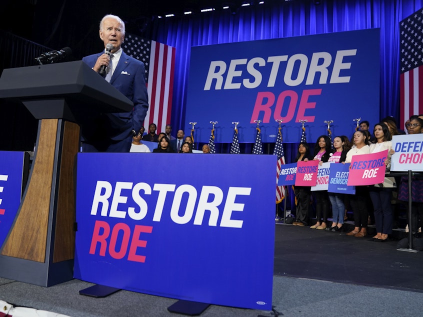 caption: President Joe Biden speaks about abortion access during a Democratic National Committee event at the Howard Theatre in Washington, D.C., on Oct. 18.