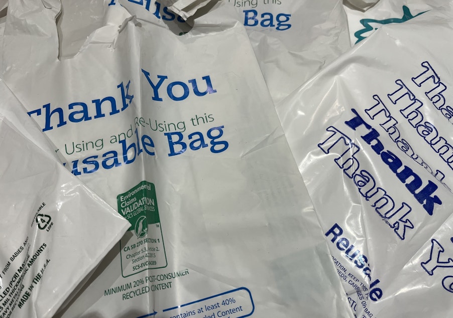 caption: Thin, single-use plastic bags have been replaced with thicker ones intended for multiple use. But a new study shows many people tend to use the bags just once.