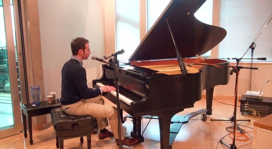 caption: Pianist Arthur Migliazza performs in the KUOW studios on Jan. 30, 2015.