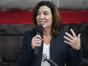 caption: New York Lt. Gov. Kathy Hochul speaks at a ribbon-cutting ceremony in May in the Bronx borough of New York.