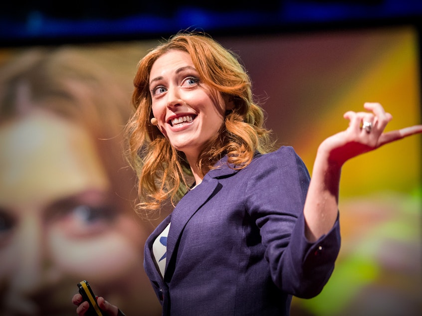 caption: Kelly McGonigal on the TED stage
