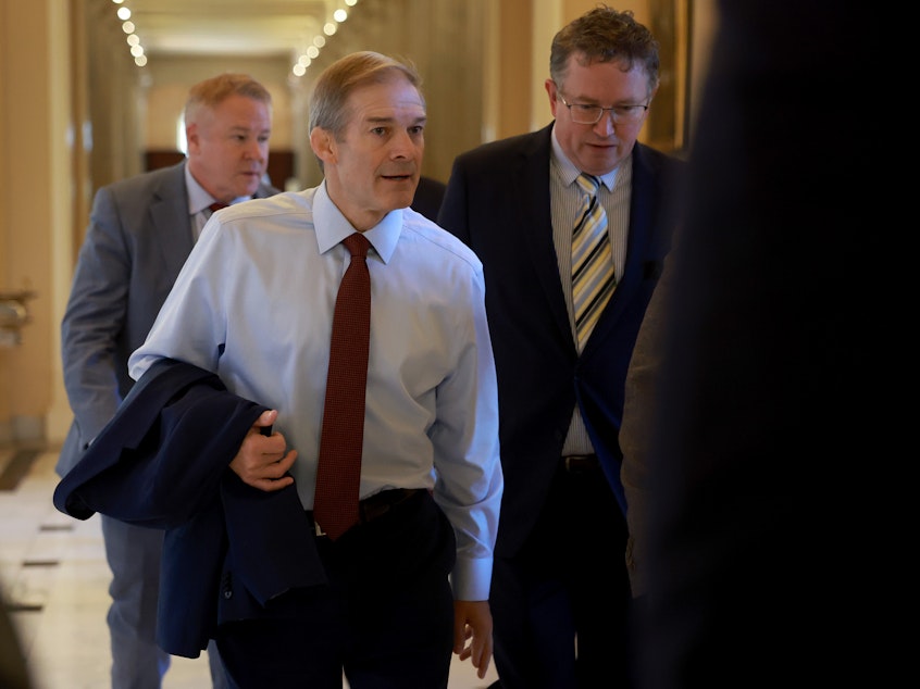 caption: Rep. Jim Jordan, R-Ohio., with Rep. Thomas Massie, R-Ky., is still struggling to build enough support to be elected speaker of the House after falling short on the first ballot on Tuesday.
