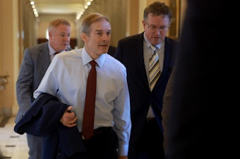 caption: Rep. Jim Jordan, R-Ohio., with  Rep. Thomas Massie, R-Ky., is still struggling to build enough support to be elected speaker of the House after falling short on the first ballot on Tuesday.