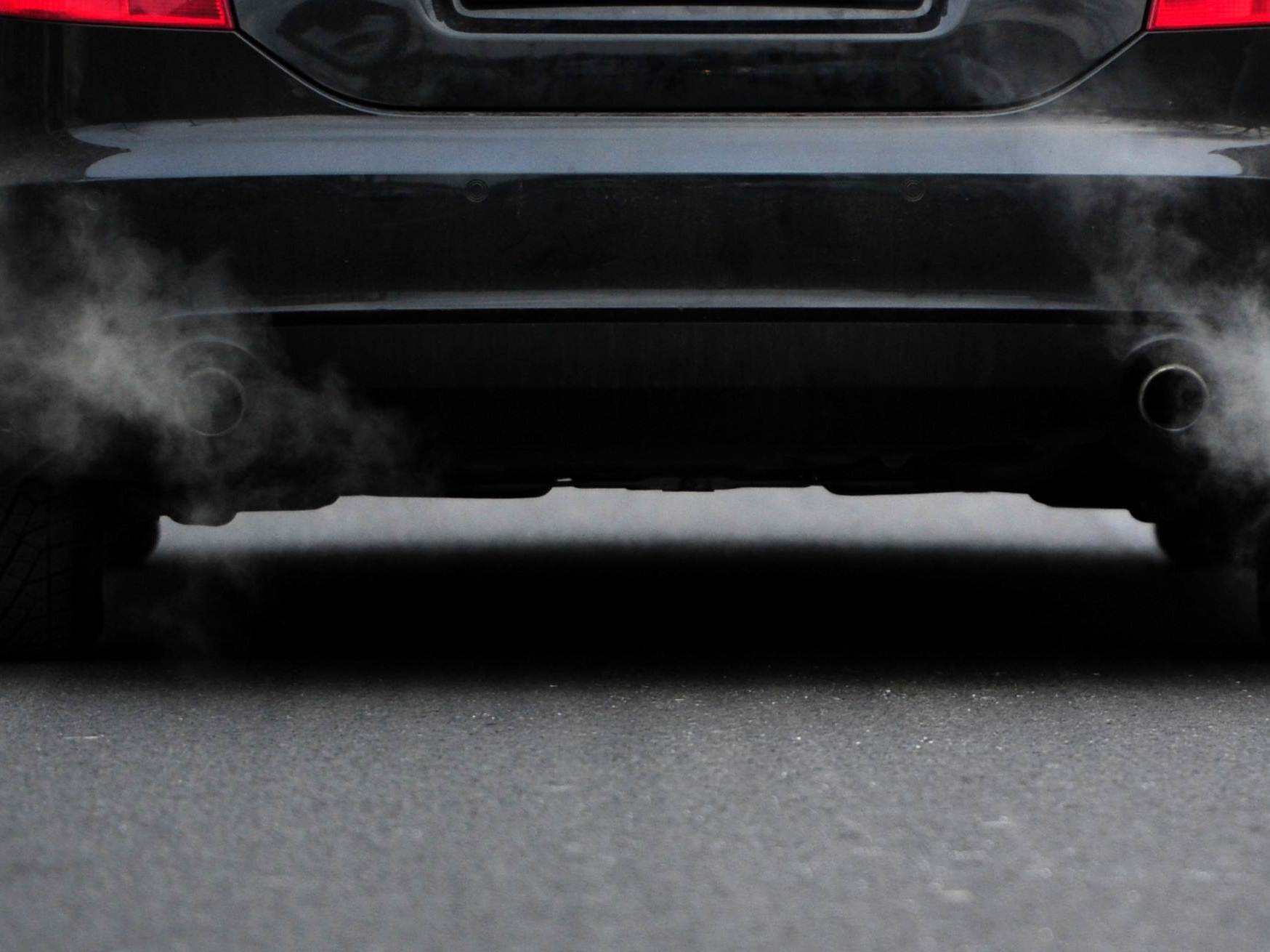 caption: Most American cars run on gasoline. But analysts say that's poised to change as electric vehicles take over the market, although they disagree on how soon.