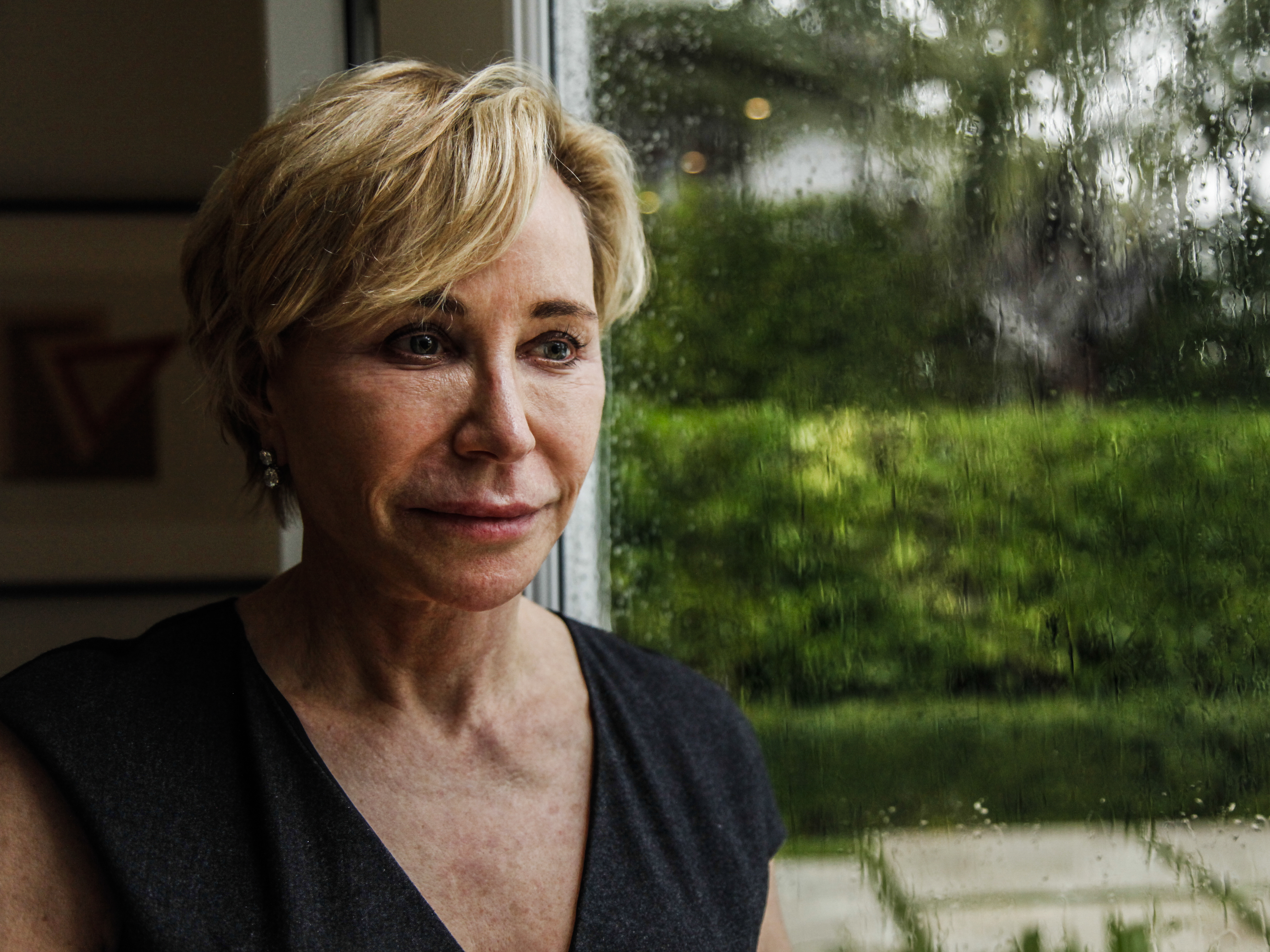 caption: Diane Walder says she's not a "global warming scaredy-cat." But she says she has noticed sea levels rise around her waterfront home in Miami Beach.