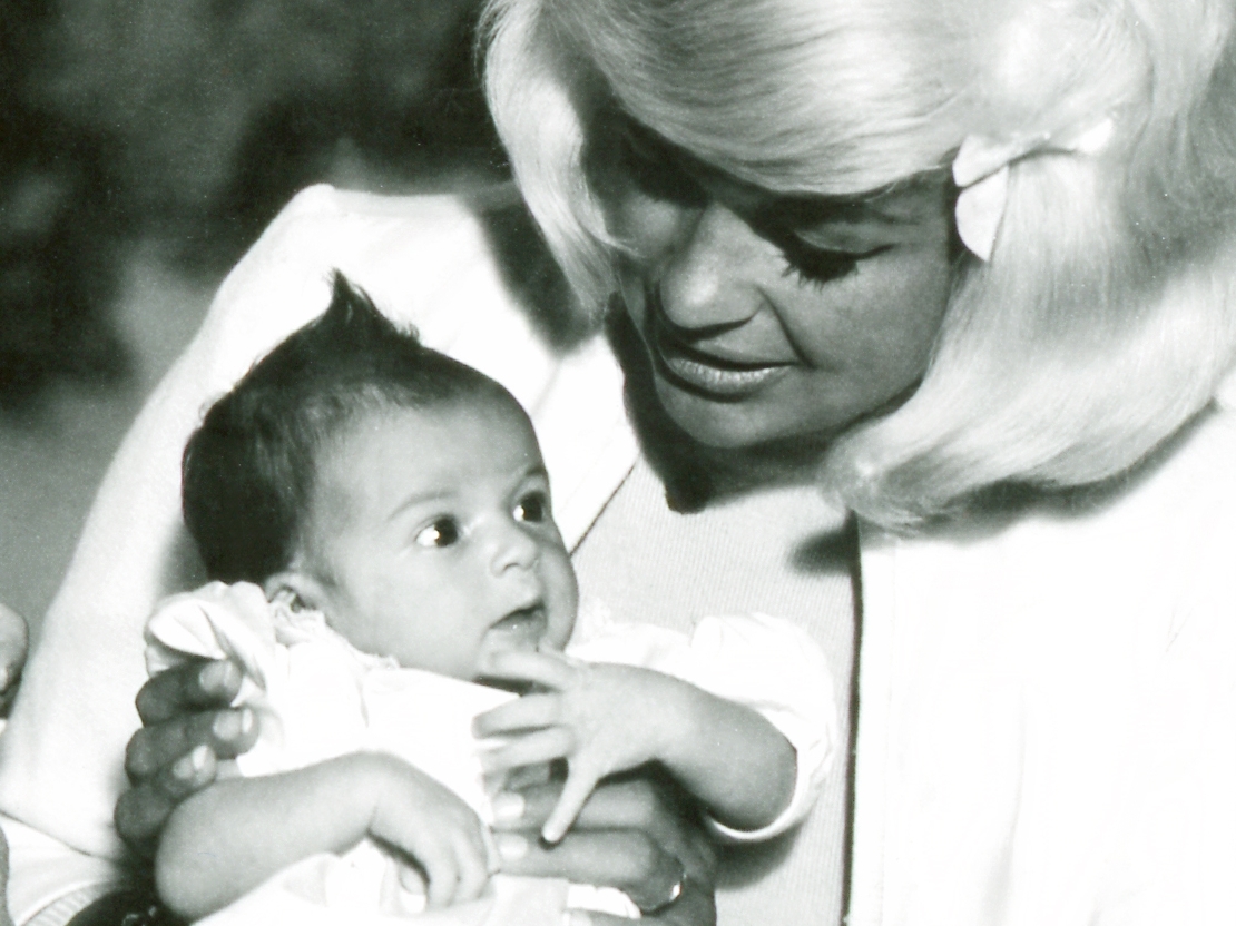 caption: Jayne Mansfield holds her daughter Mariska Hargitay.