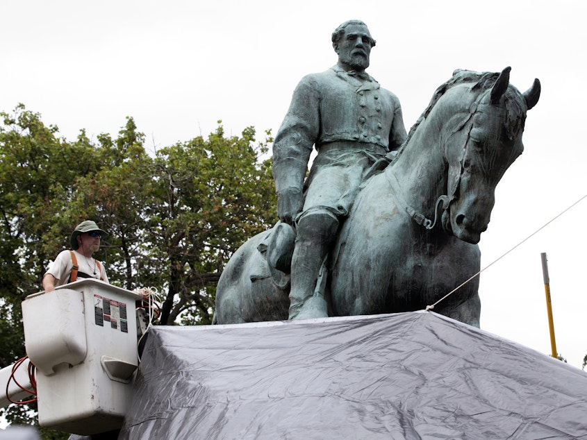 caption: The Virginia House and Senate voted Tuesday to approve bills that would allow cities to decide if Confederate statues should be removed.